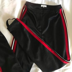 Mistress rocks black stripped pants